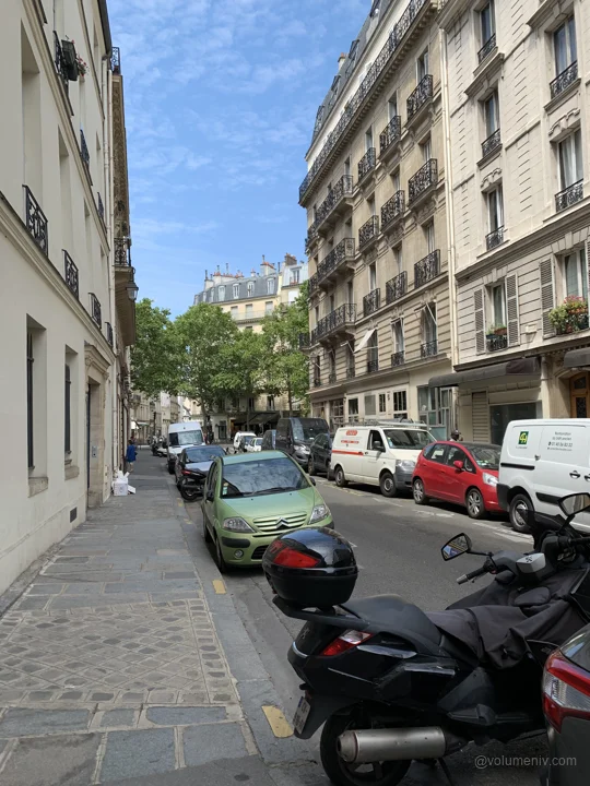 A street of parked scooters