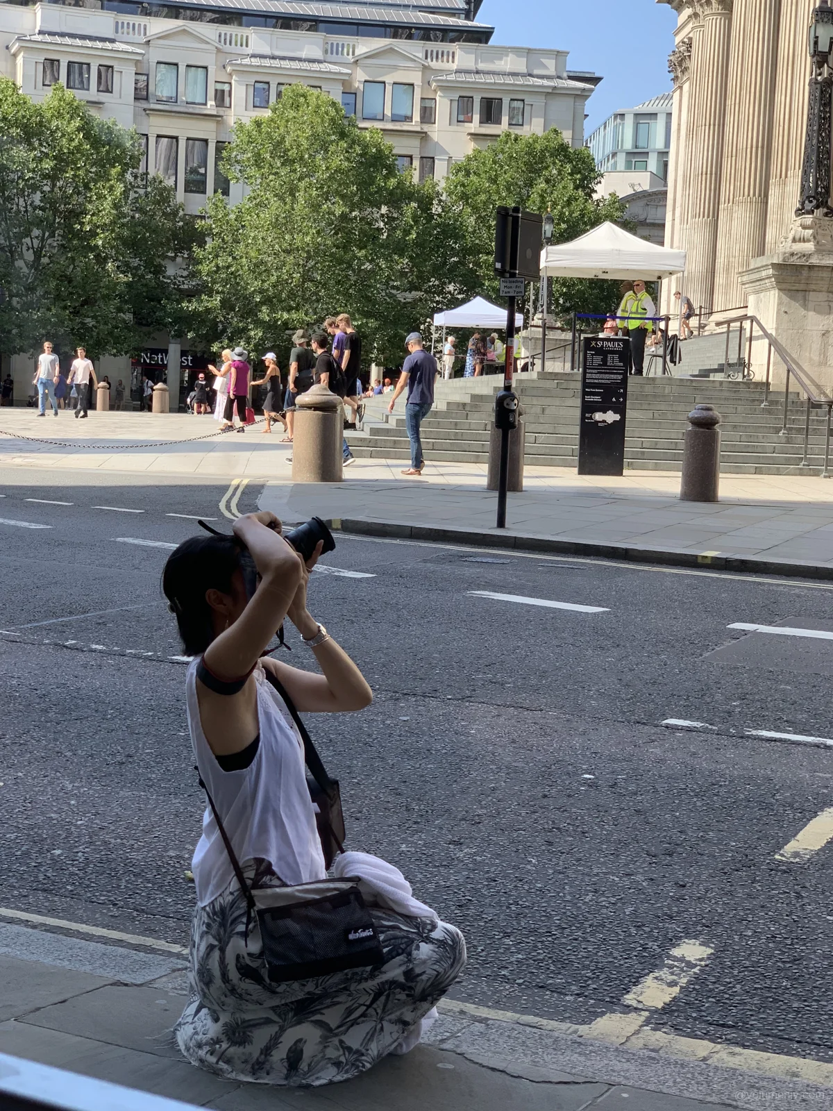 Observing an Observor — a photographer taking a picture outside St. Paul’s Cathedral